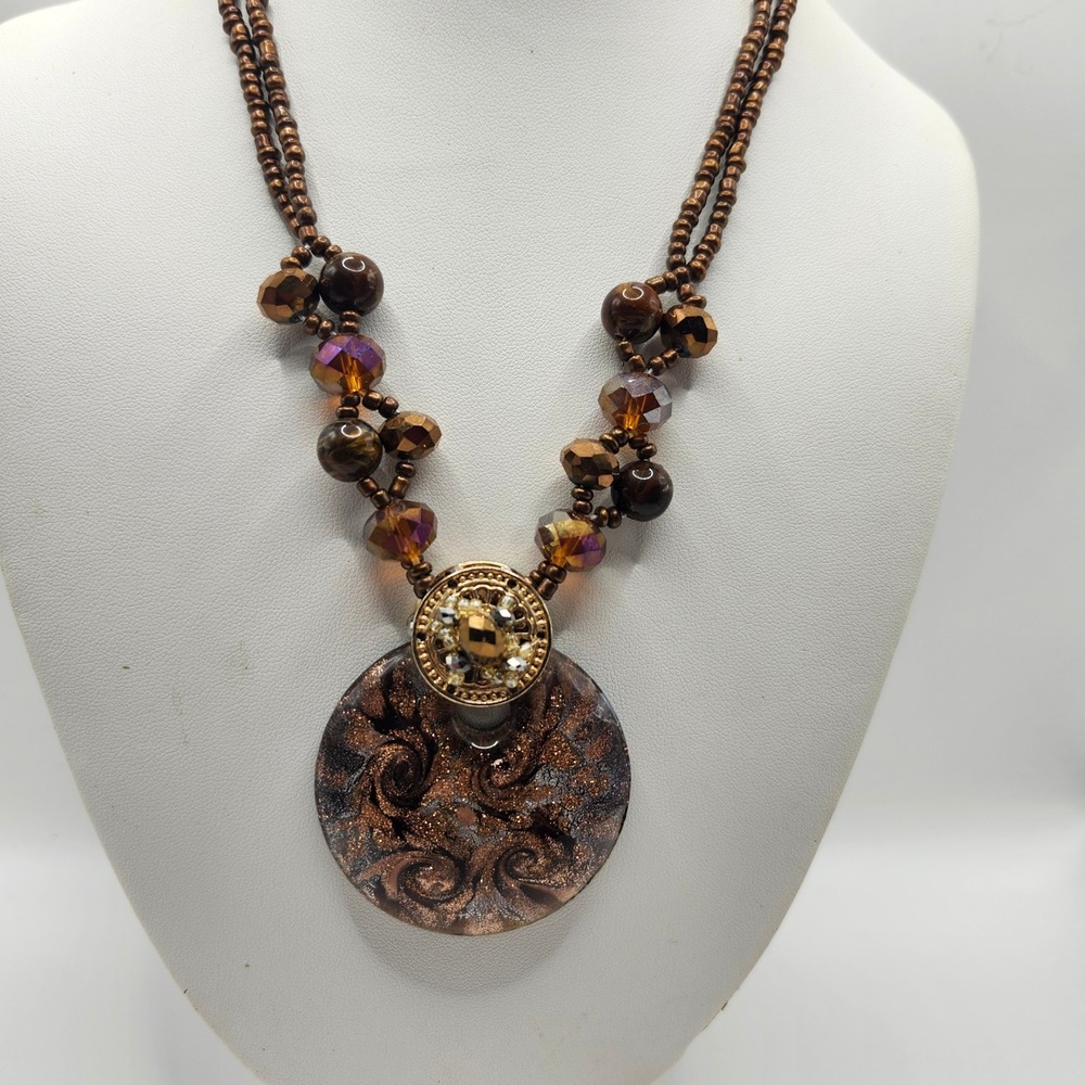 Bronze Beaded Necklace with Large‎ Swirl Glass Pendant and Gold Tone Accents